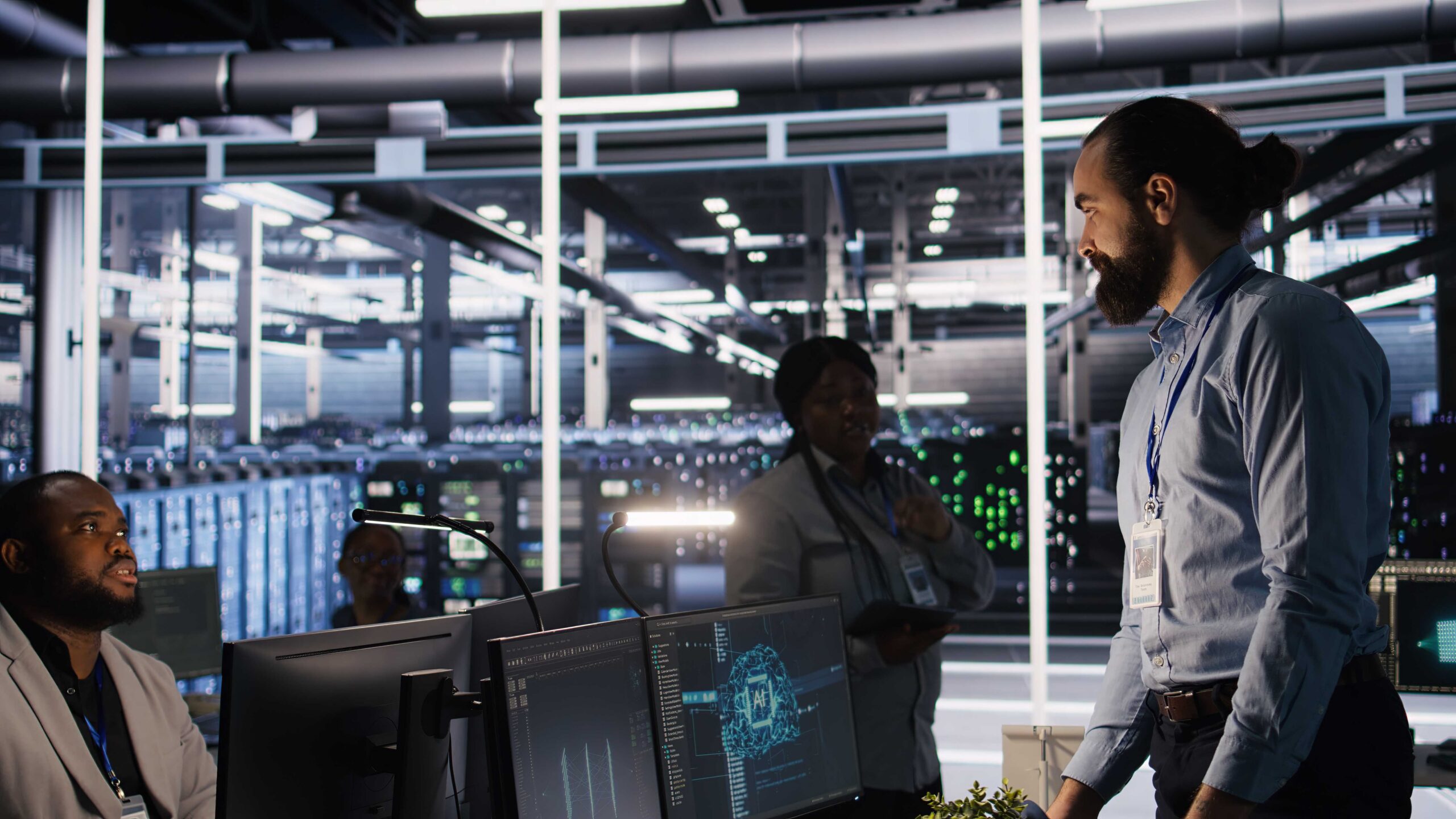 Upset data center worker packing personal items at workstation after being replaced by AI. Programmer removing belongings from server hub workplace desk, fired by artificial intelligence, camera A